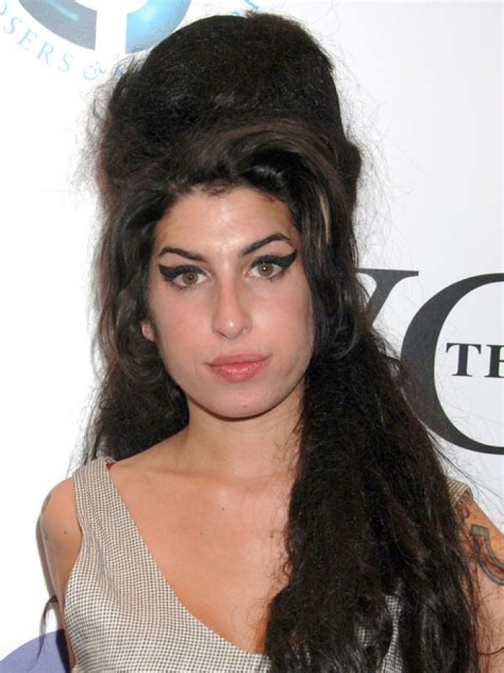 Amy Winehouse is 'resilient and desperate' in unseen portrait taken two