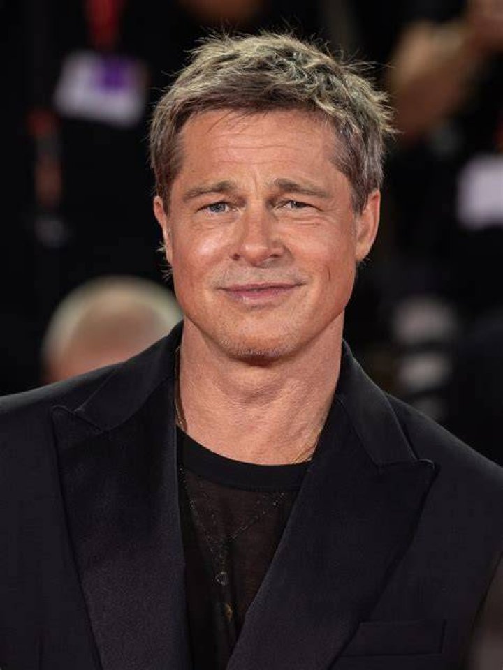 Brad Pitt, 56, Defies His Age Wearing Classic Suit & Jewelry as He