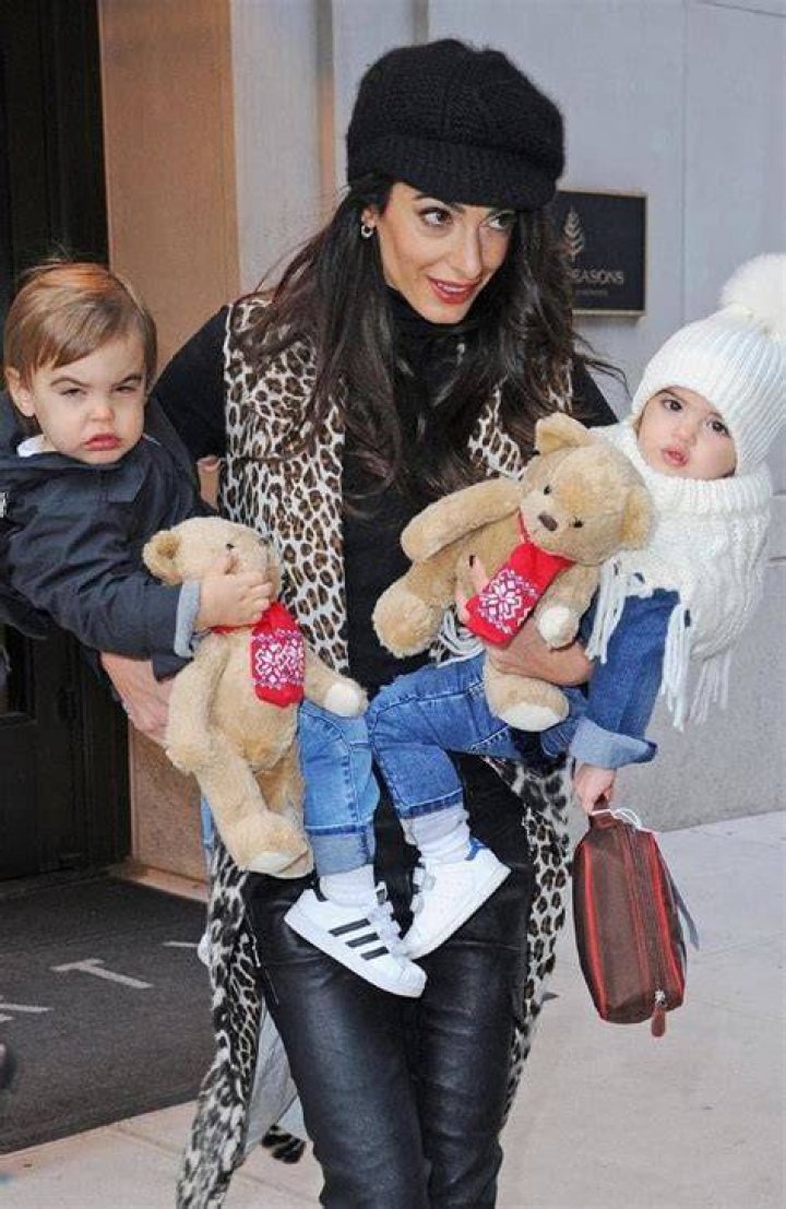 Clooney’s wife Amal juggles twins after UN awards gala Photos