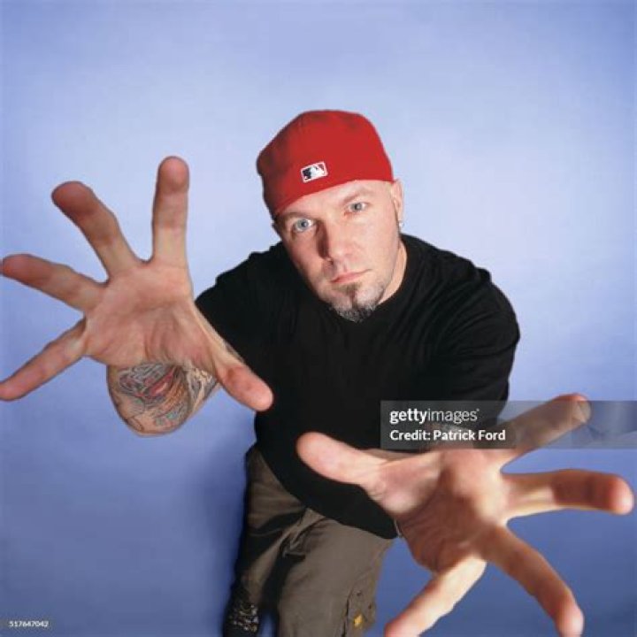 Fred Durst out and about with a friend and some children on Mother's