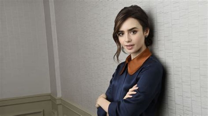 Inside Lily Collins' Relationship With Eddie Redmayne