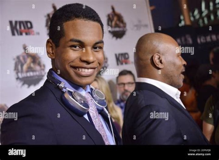 (LR) Miguel Leon Tyson and Dad Mike Tyson arrives at the "Kickboxer