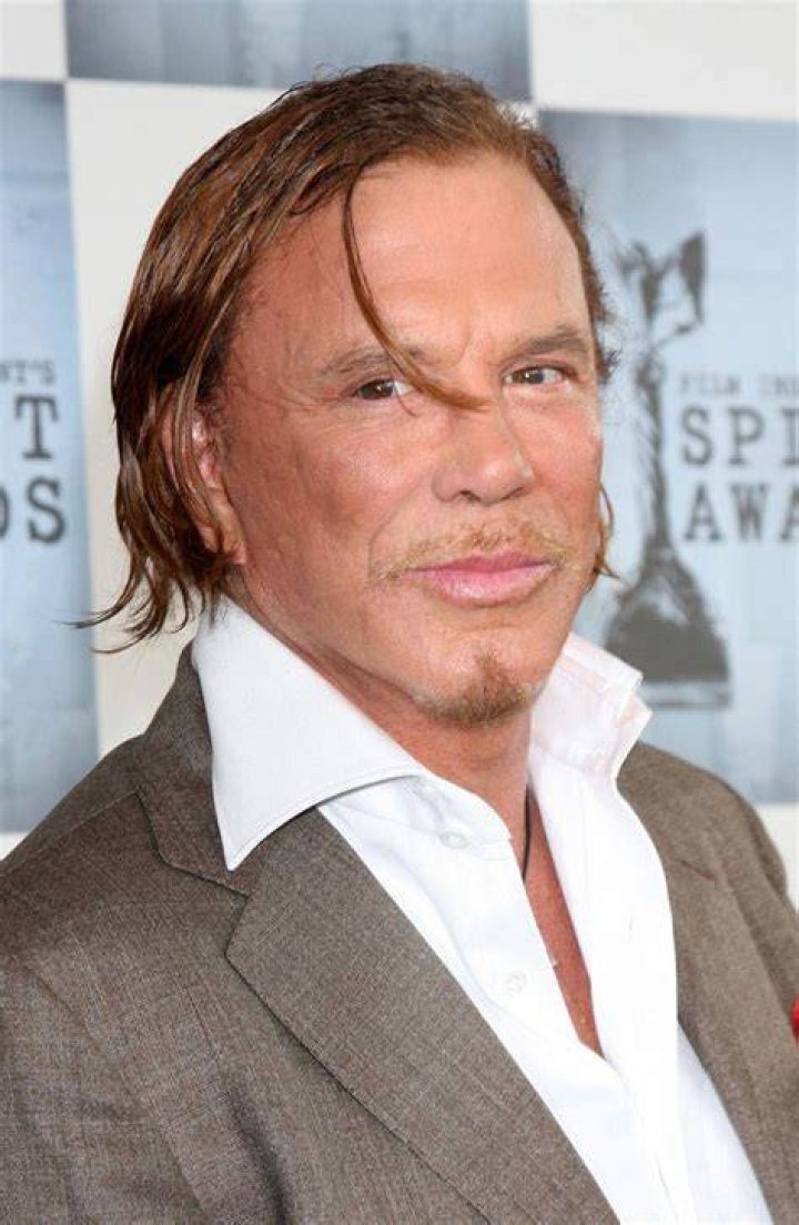 Mickey Rourke breaks down in tears while out in LAas he is consoled