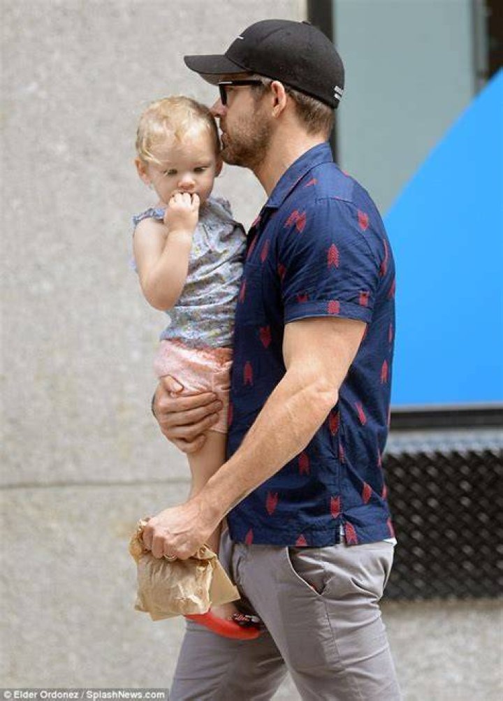 Ryan Reynolds dotes on oneyearold daughter Inez as he carries toddler