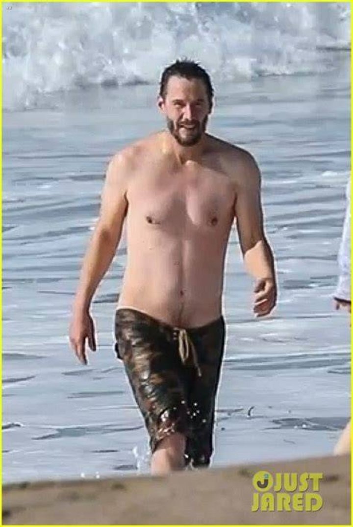 Shirtless Keanu Reeves Lounges on a Boat in Italy &mdash; See the Photos