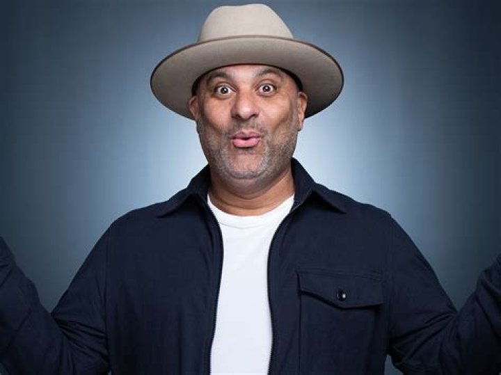 What is Russell Peters' wife's name? Comedian gets married with several